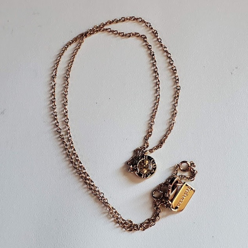 Coach Gold Tone Open Circle Halo Solitaire Crystal Pendant Necklace Adjustable